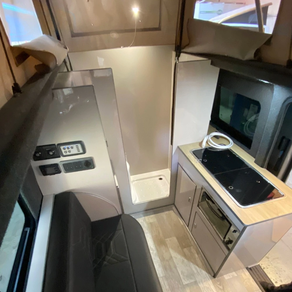 The modern interior of a small camper van.